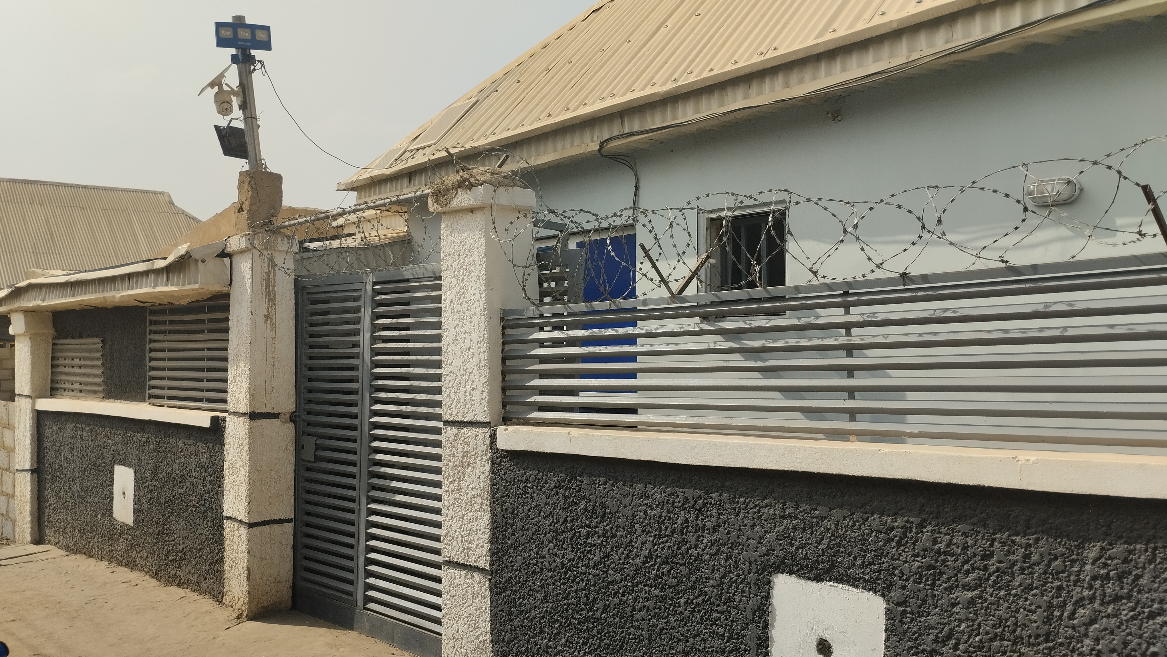 Gracious Lodge entrance gate, Aleyita off Airport Road, Abuja